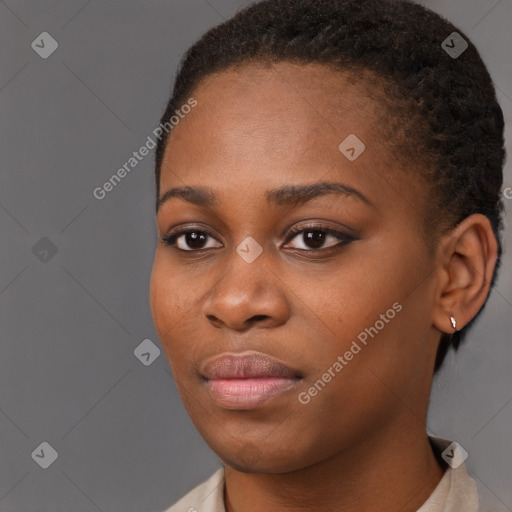 Neutral black young-adult female with short  black hair and brown eyes