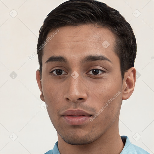 Neutral white young-adult male with short  brown hair and brown eyes