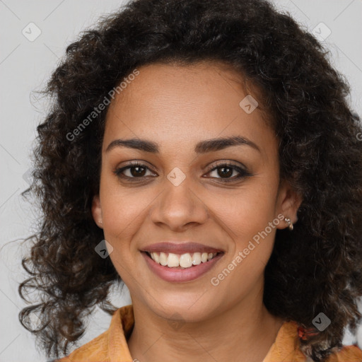 Joyful latino young-adult female with medium  brown hair and brown eyes