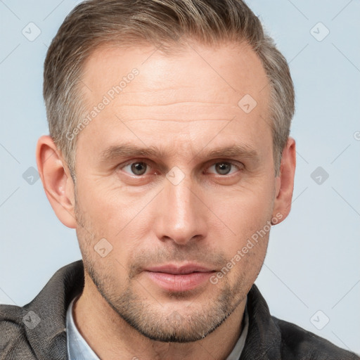 Neutral white adult male with short  brown hair and grey eyes