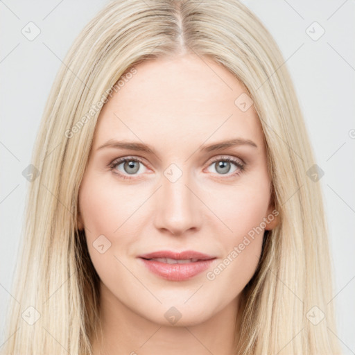 Joyful white young-adult female with long  brown hair and blue eyes