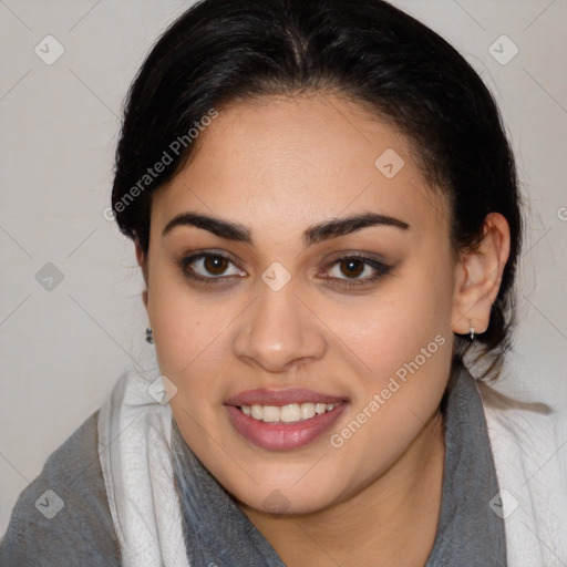 Joyful latino young-adult female with medium  brown hair and brown eyes