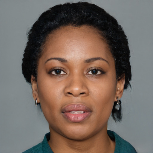 Neutral black young-adult female with medium  black hair and brown eyes