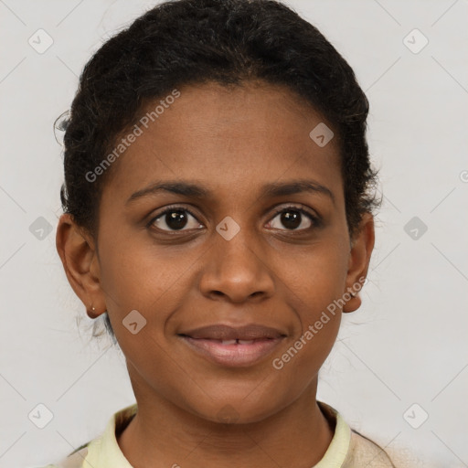 Joyful black young-adult female with short  brown hair and brown eyes