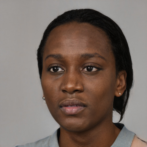 Neutral black young-adult female with medium  black hair and brown eyes