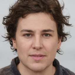 Joyful white young-adult male with medium  brown hair and brown eyes