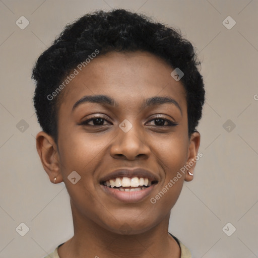 Joyful black young-adult female with short  black hair and brown eyes