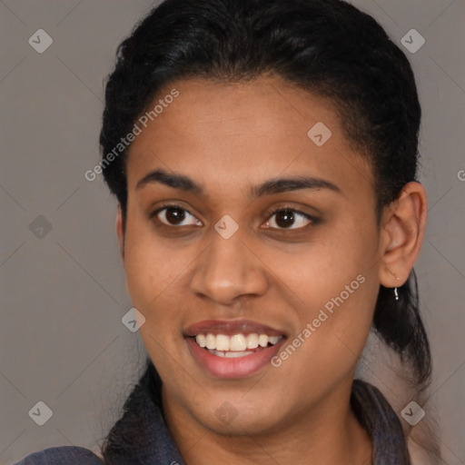 Joyful latino young-adult female with short  brown hair and brown eyes