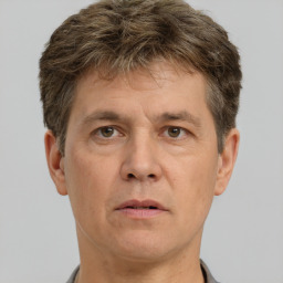 Neutral white adult male with short  brown hair and brown eyes