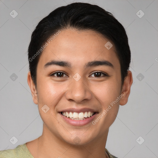 Joyful latino young-adult male with short  black hair and brown eyes