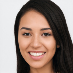 Joyful white young-adult female with long  black hair and brown eyes