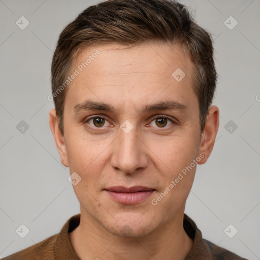 Joyful white adult male with short  brown hair and brown eyes