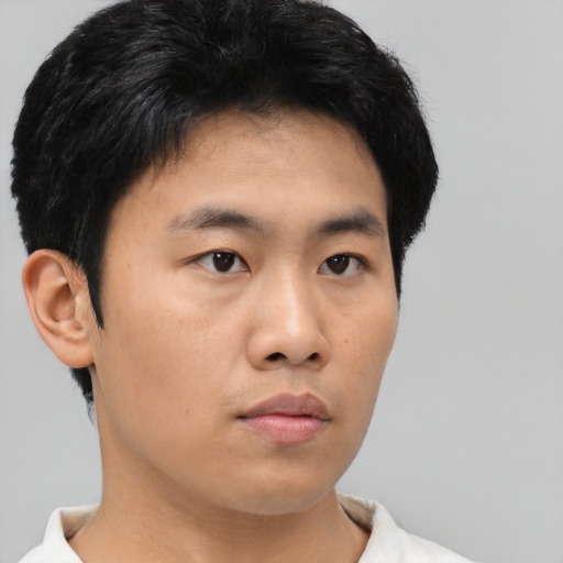 Neutral asian young-adult male with short  black hair and brown eyes