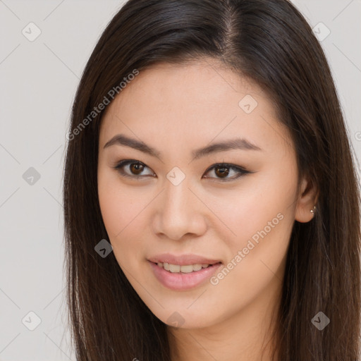 Joyful white young-adult female with long  brown hair and brown eyes