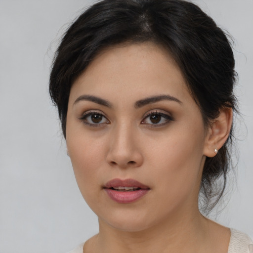 Neutral asian young-adult female with medium  brown hair and brown eyes