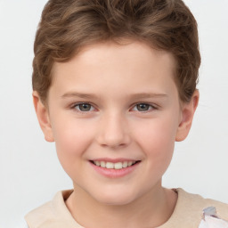 Joyful white child male with short  brown hair and brown eyes