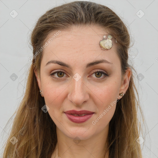 Joyful white adult female with long  brown hair and grey eyes