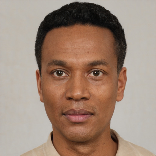 Neutral latino adult male with short  black hair and brown eyes