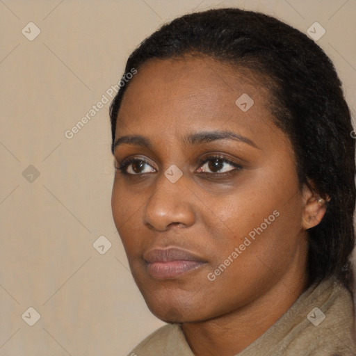 Neutral black young-adult female with short  black hair and brown eyes