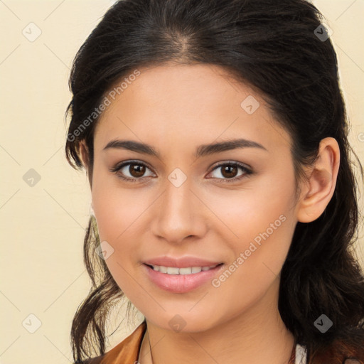 Joyful latino young-adult female with long  brown hair and brown eyes