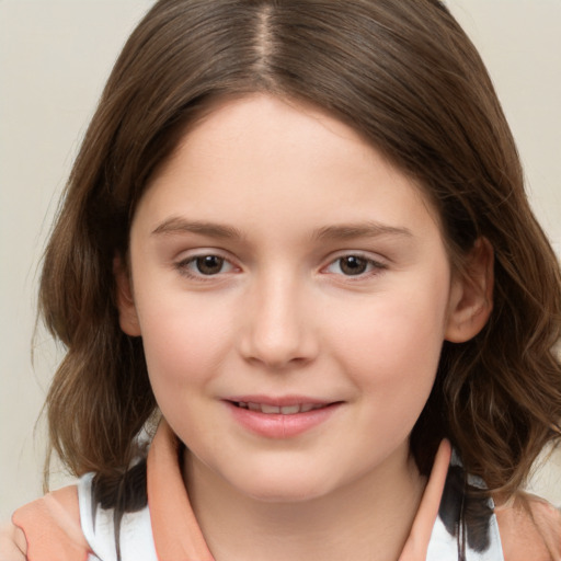 Joyful white child female with medium  brown hair and brown eyes