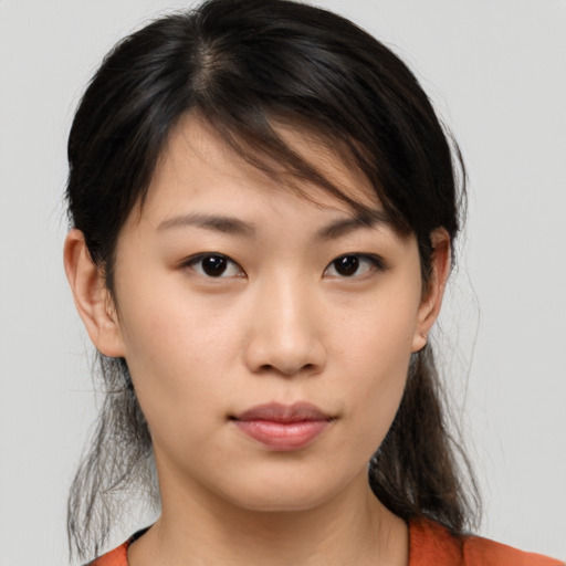 Neutral asian young-adult female with medium  brown hair and brown eyes