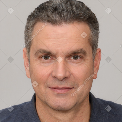 Joyful white adult male with short  brown hair and brown eyes