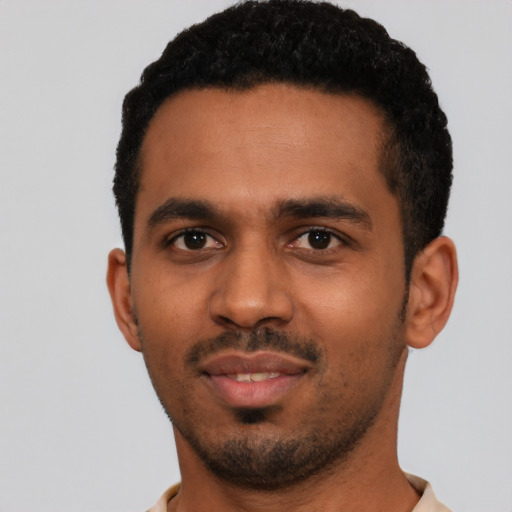 Neutral black young-adult male with short  black hair and brown eyes