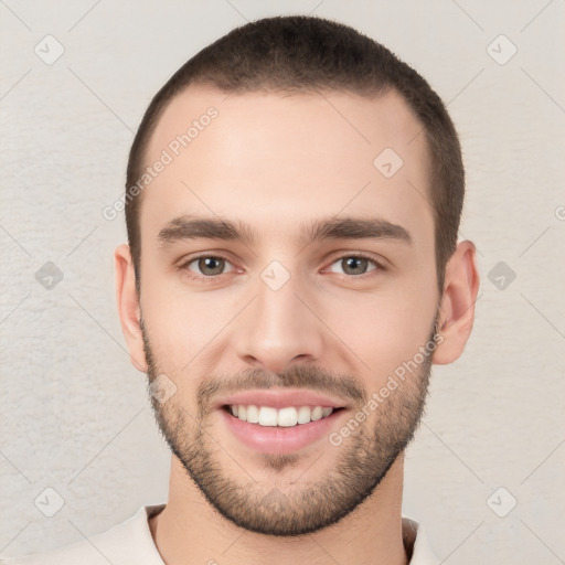 Joyful white young-adult male with short  black hair and brown eyes