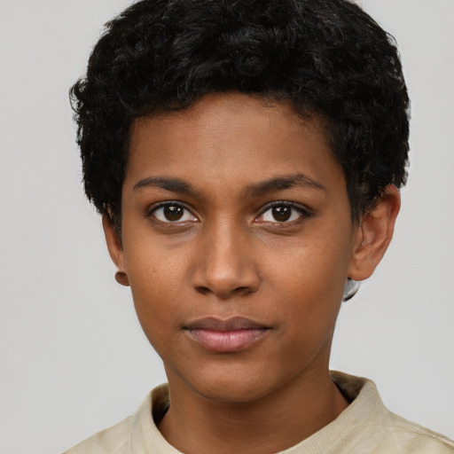 Neutral black young-adult female with short  black hair and brown eyes