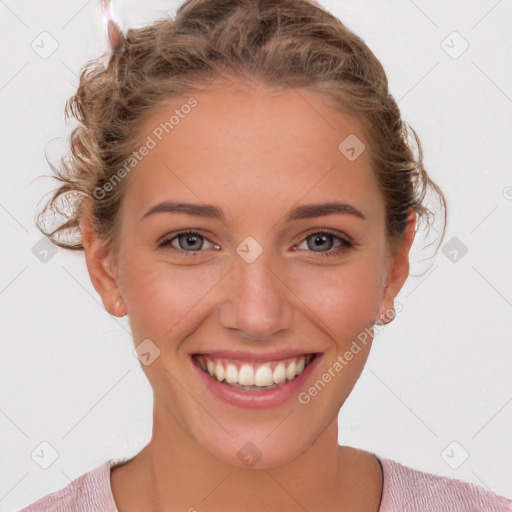 Joyful white young-adult female with medium  brown hair and blue eyes