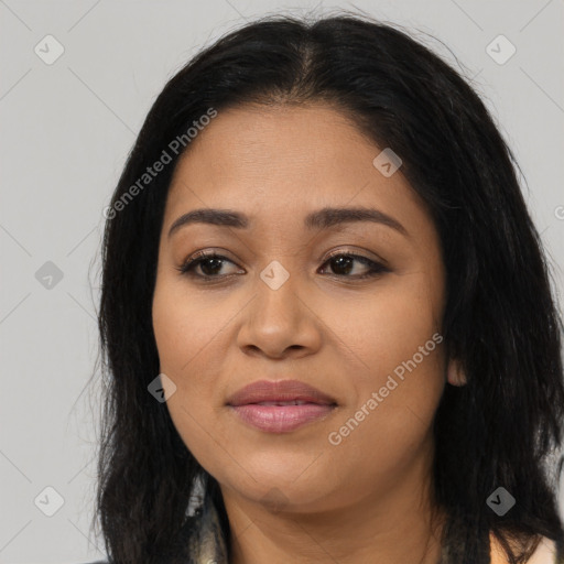 Joyful latino young-adult female with long  brown hair and brown eyes