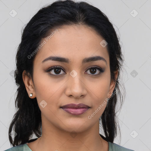 Joyful latino young-adult female with medium  black hair and brown eyes