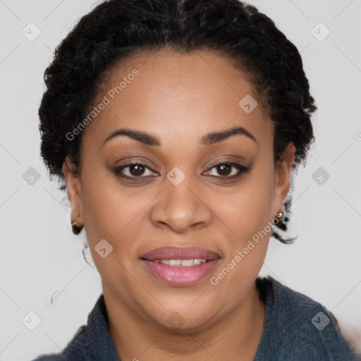 Joyful black adult female with short  brown hair and brown eyes