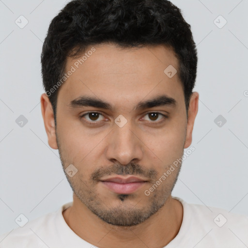 Neutral latino young-adult male with short  black hair and brown eyes