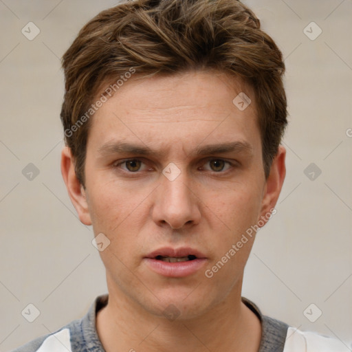 Neutral white young-adult male with short  brown hair and grey eyes