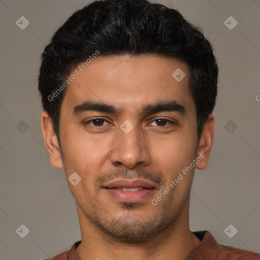 Joyful asian young-adult male with short  black hair and brown eyes