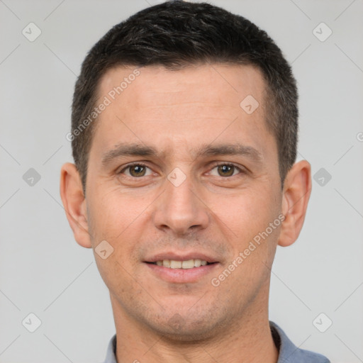 Joyful white young-adult male with short  brown hair and brown eyes