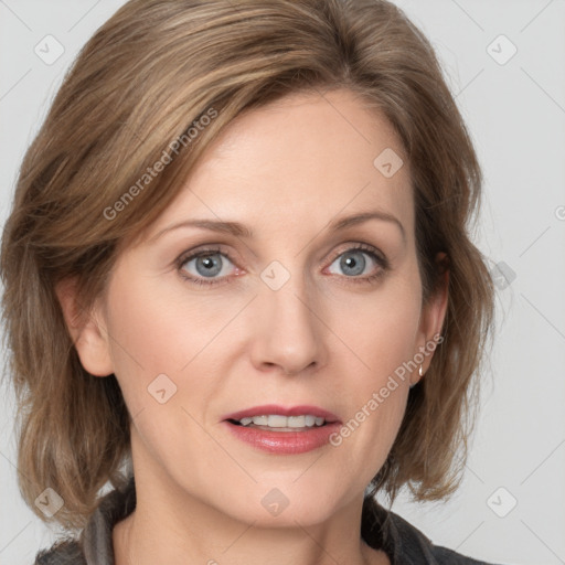 Joyful white young-adult female with medium  brown hair and blue eyes