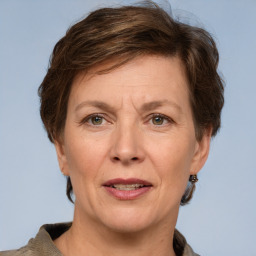 Joyful white adult female with short  brown hair and grey eyes