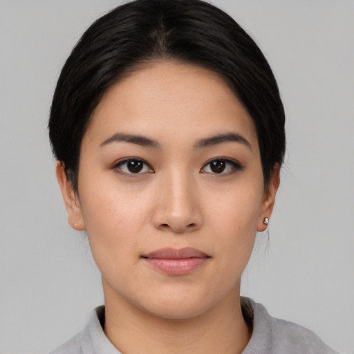 Neutral asian young-adult female with medium  black hair and brown eyes