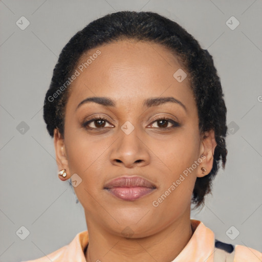 Joyful latino young-adult female with short  brown hair and brown eyes