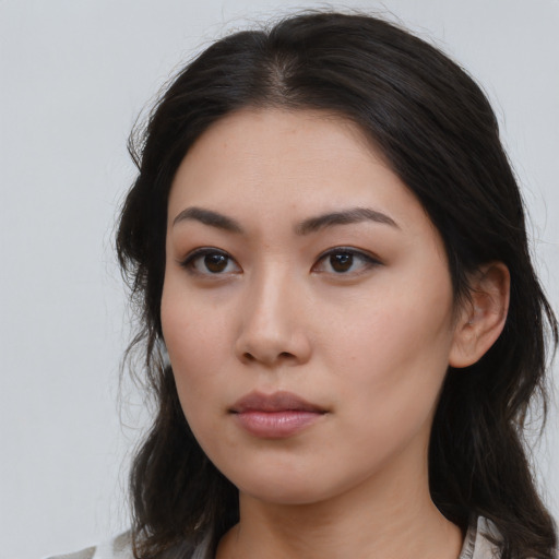 Neutral asian young-adult female with medium  brown hair and brown eyes