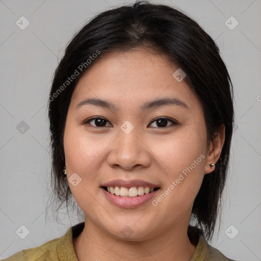 Joyful white young-adult female with medium  brown hair and brown eyes