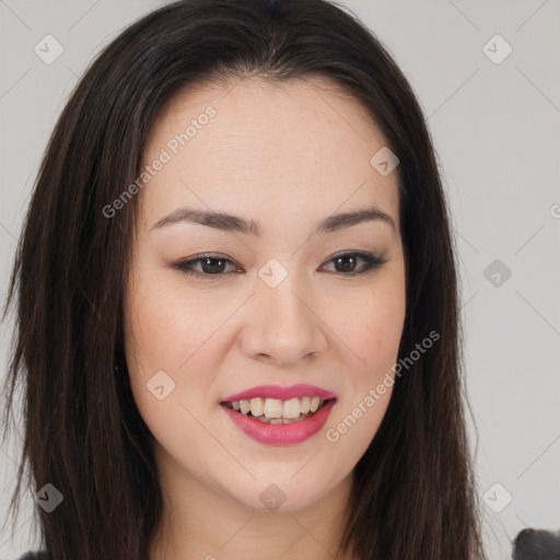 Joyful asian young-adult female with long  brown hair and brown eyes