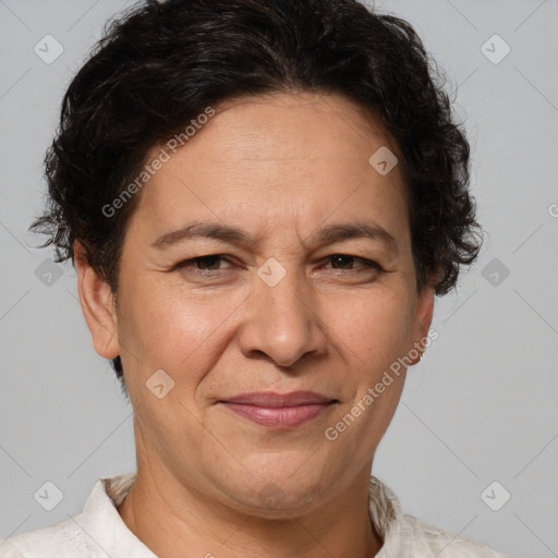 Joyful white adult female with short  brown hair and brown eyes