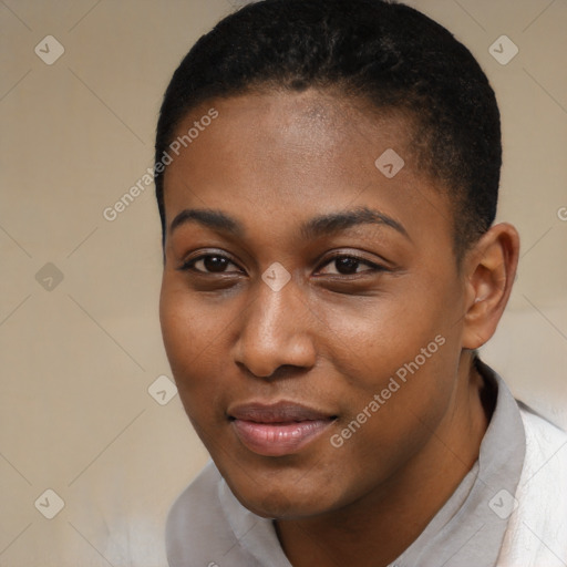 Joyful black young-adult female with short  black hair and brown eyes