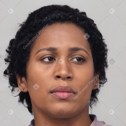 Neutral black young-adult female with medium  brown hair and brown eyes