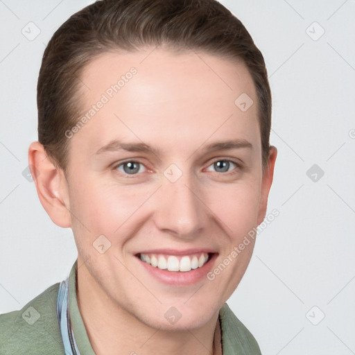 Joyful white young-adult female with short  brown hair and grey eyes