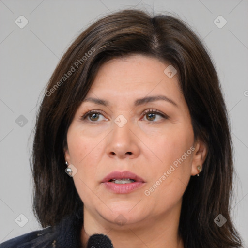 Joyful white adult female with medium  brown hair and brown eyes